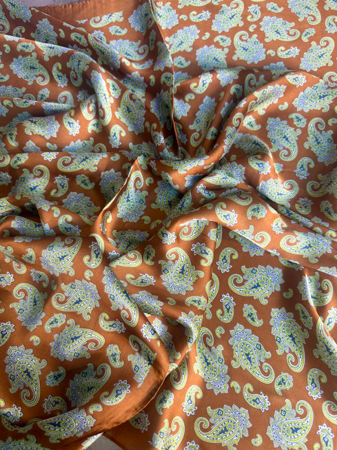 
                  
                    Load image into Gallery viewer, Rust + Turquoise Paisley Wild Rag
                  
                
